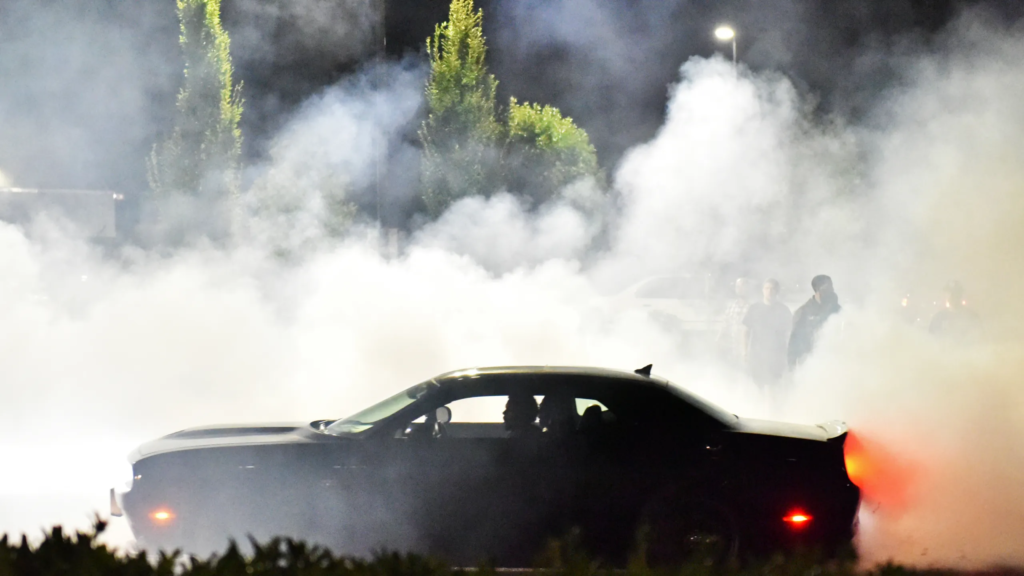 Shocking Video: Car Group Assaults Bystander Recording Meet at Memorial Park
