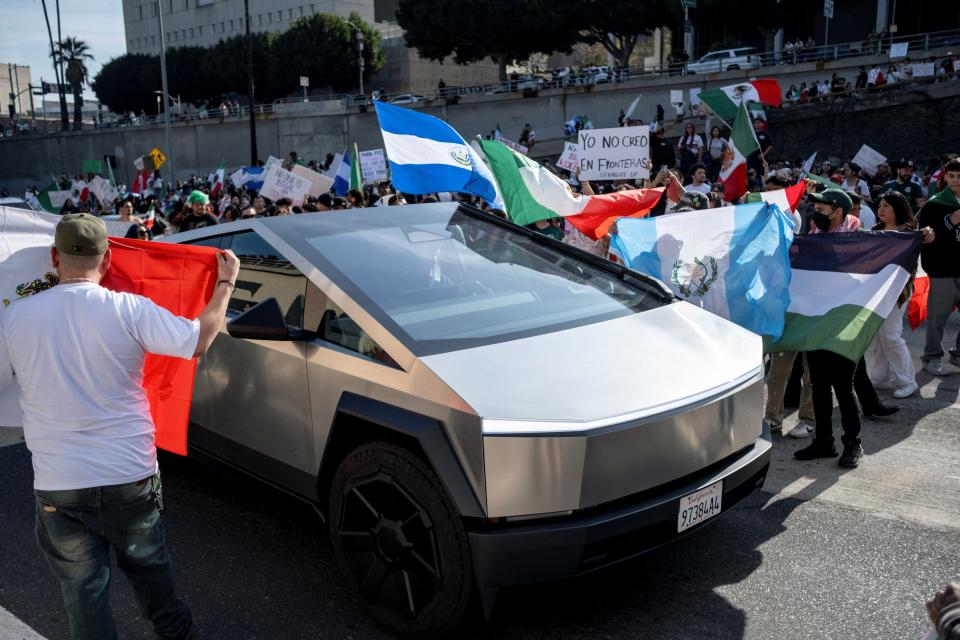 Anti-ICE Protesters Shock Public with Vandalized Tesla Cybertruck Statement